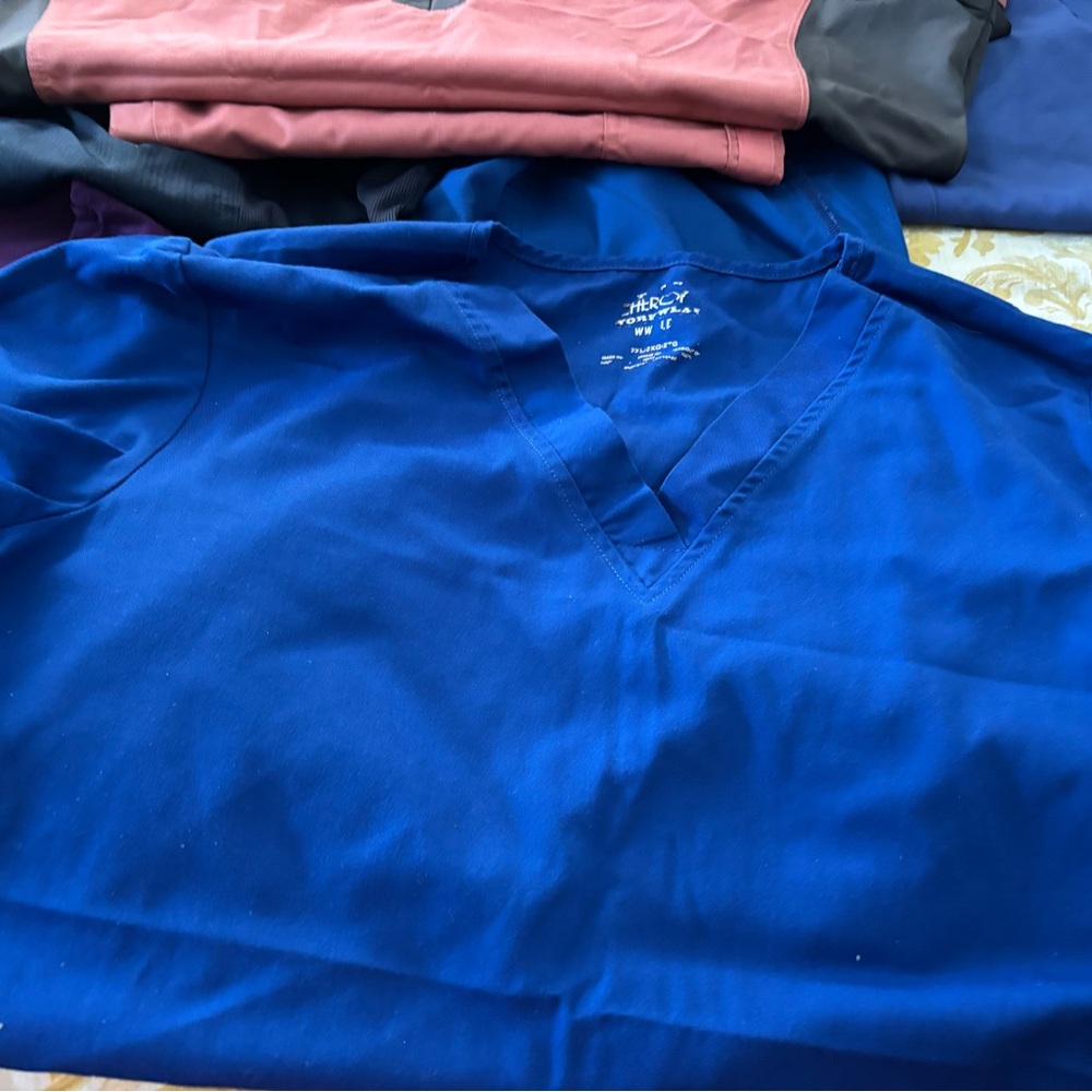 Nursing scrubs variety of brands 2xl size.  $$25 each set